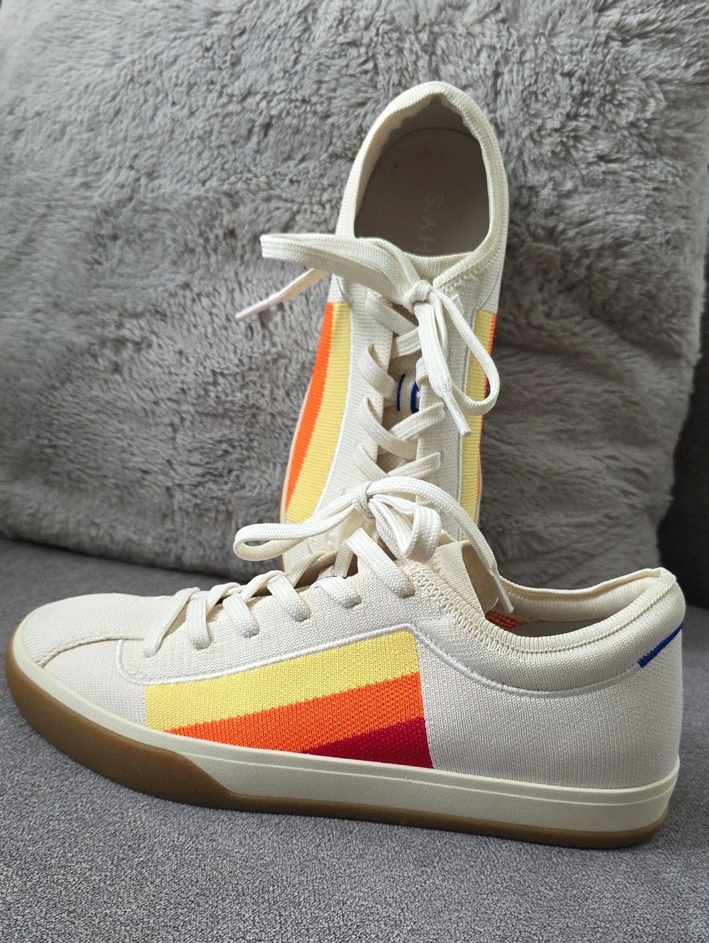 Rothy's Cream Canvas Sneakers with Yellow-Orange-Red Stripe